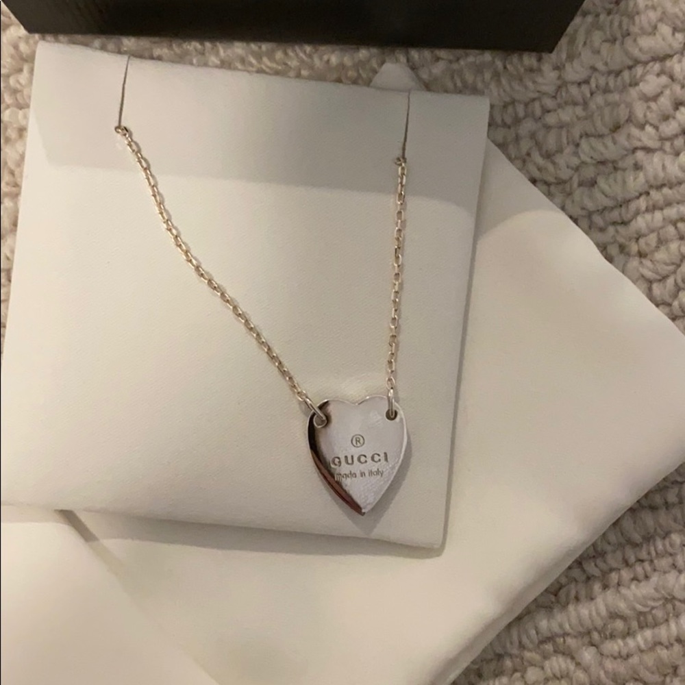 Unworn Heart bracelet with Gucci trademark